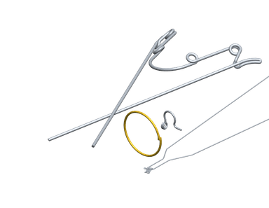 Assortment of orthodontic wireforms in stainless steel, including looped and bent wire appliances shown together on a white background.