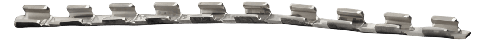 Connected orthodontic crimp stop shown as a long strip of ten identical stamped stops joined end to end in a slightly curved row.